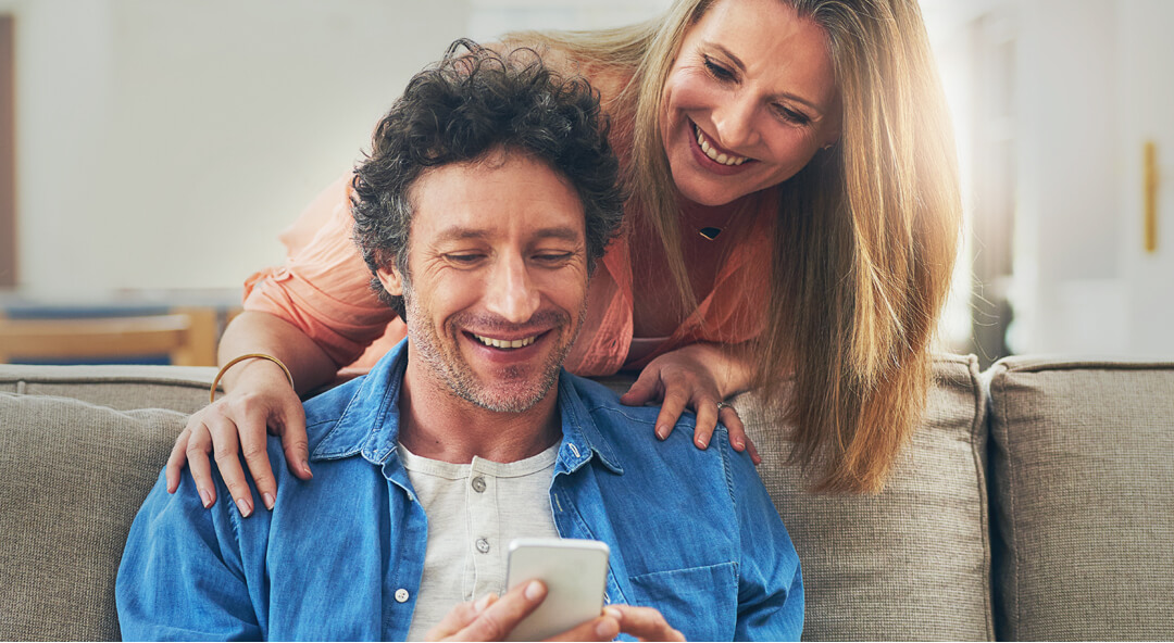 man looking at phone